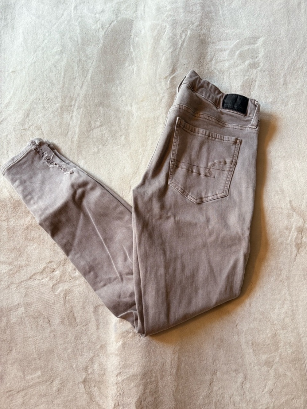 Taupe Gray AE Distressed Next Level Stretch Ripped Jegging Skinny Jean